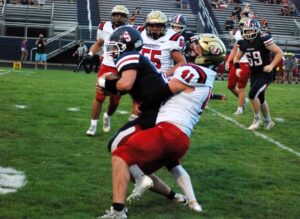 Fairmont Senior’s Brody Whitehair sets all-time passing touchdown record in 49-7 victory over University
